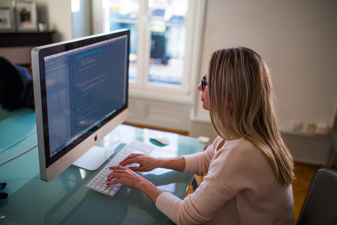 Woman working in a computer